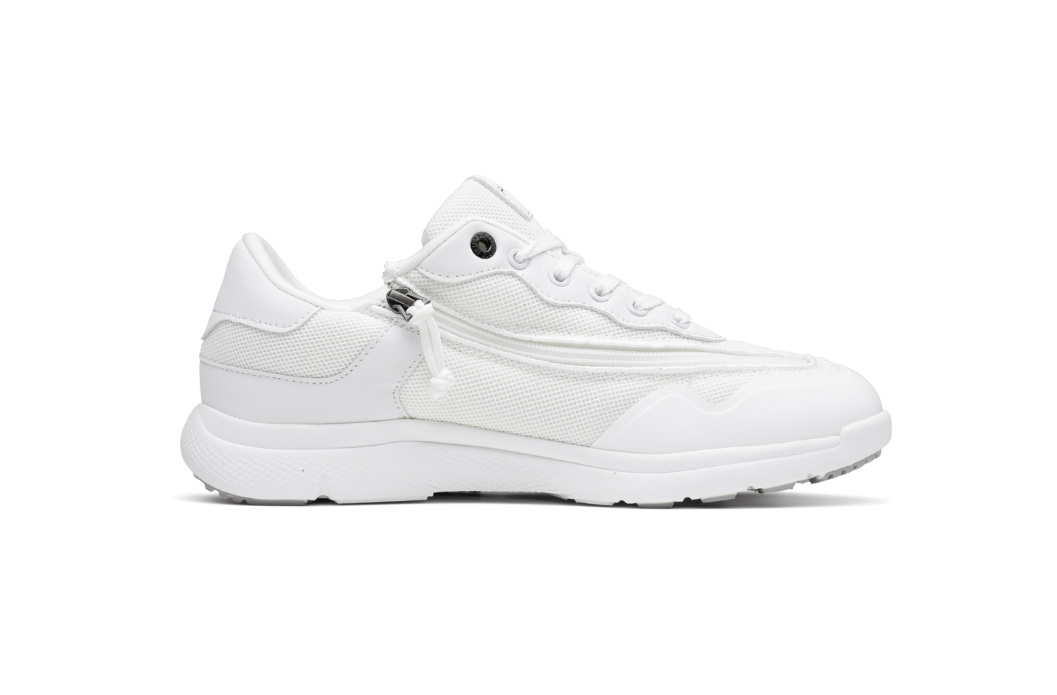 All-white adaptive sneaker with side zip closure and lace-up front, profile view