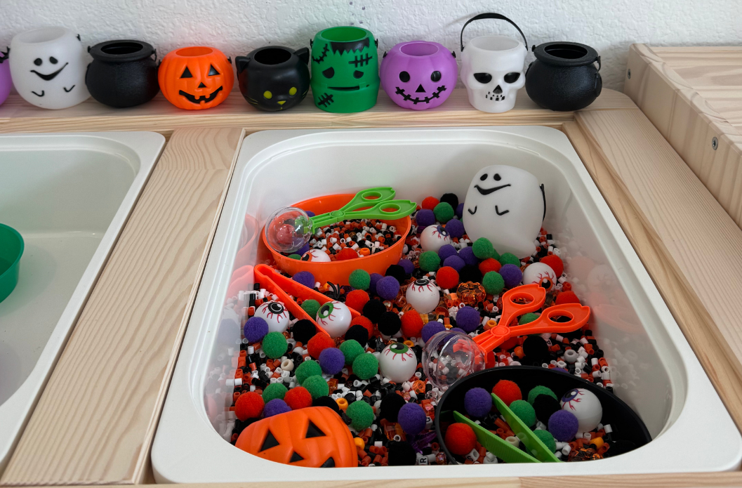 Ready-to-use Halloween sensory bin kit with scoops, sensory fillers, and Halloween-themed play accessories
