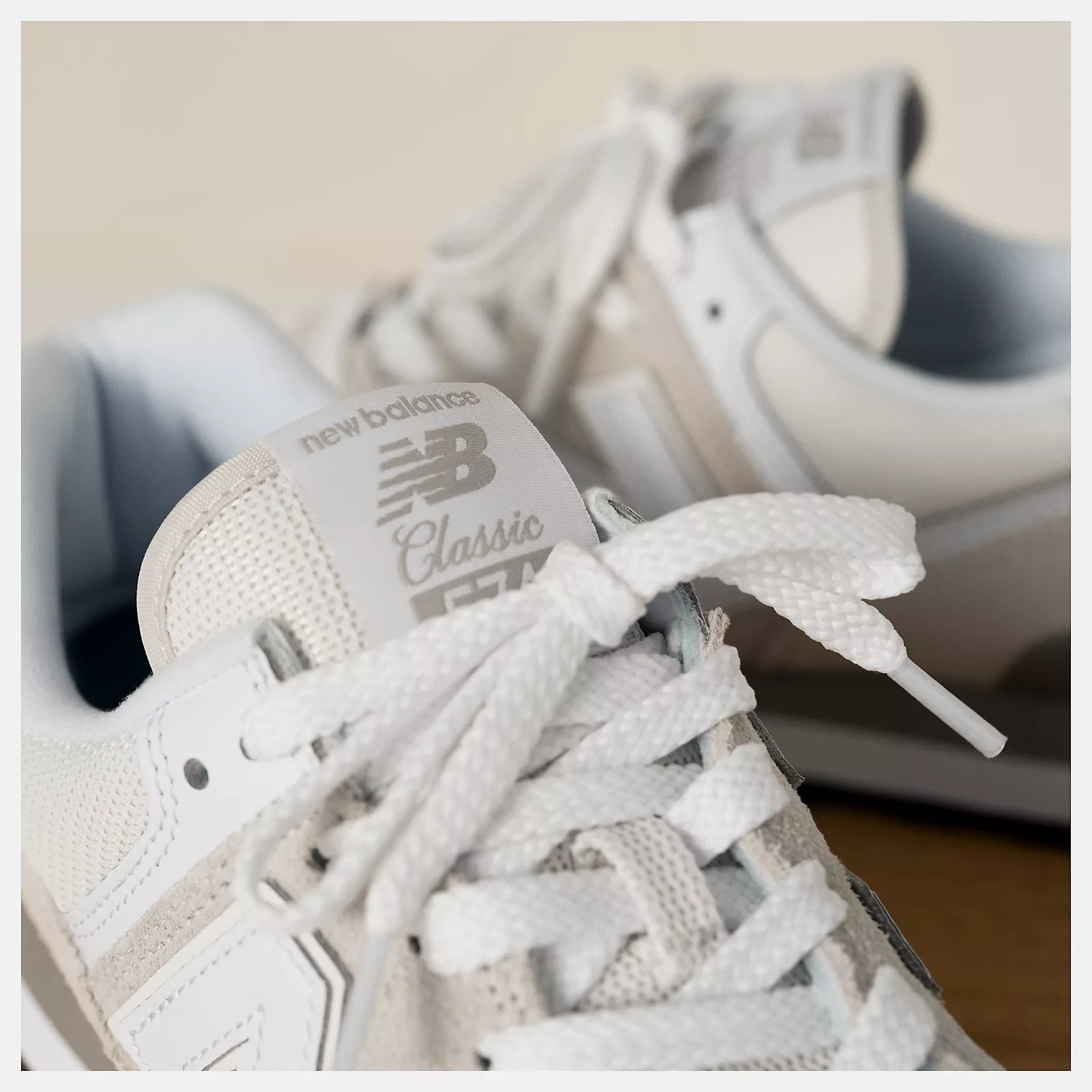 Close-up of a white New Balance sneaker recommended by AFO users for wide sizing and comfort.