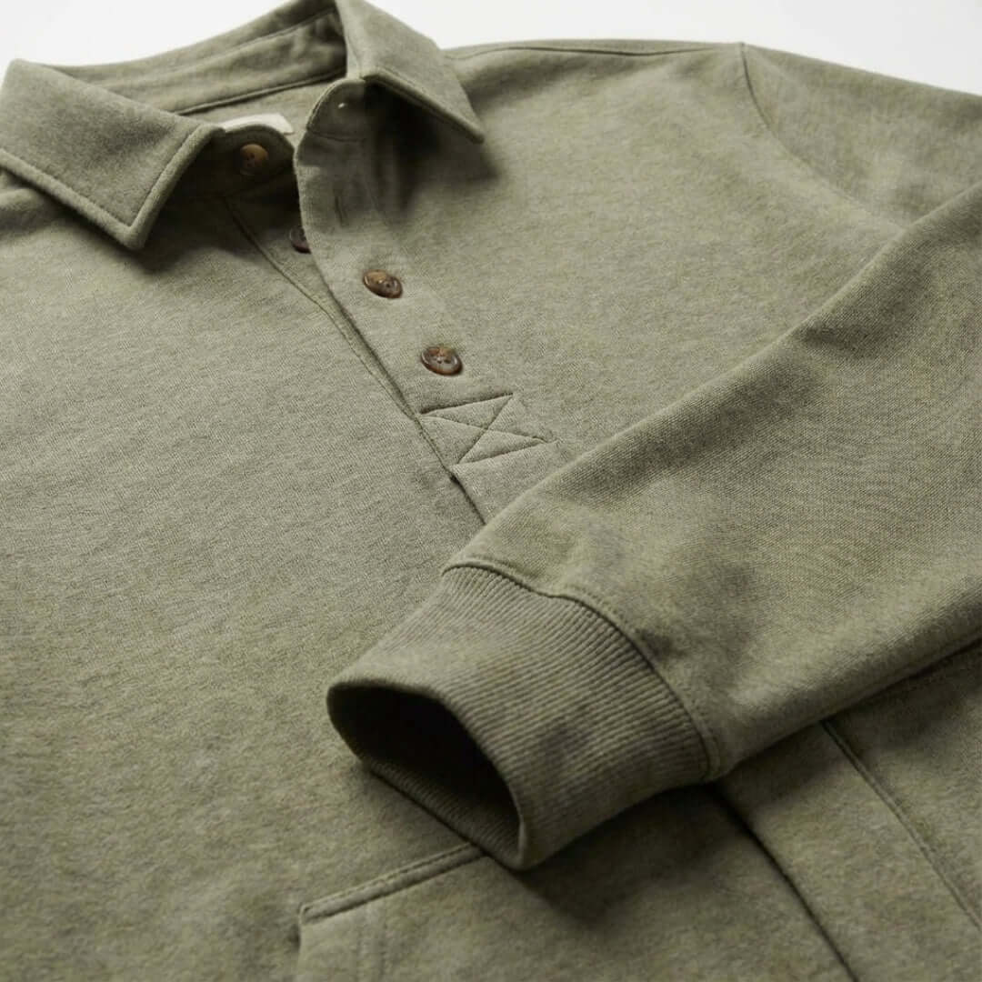 MagnaReady heathered olive sweatshirt collar, buttons, and sleeve detail.