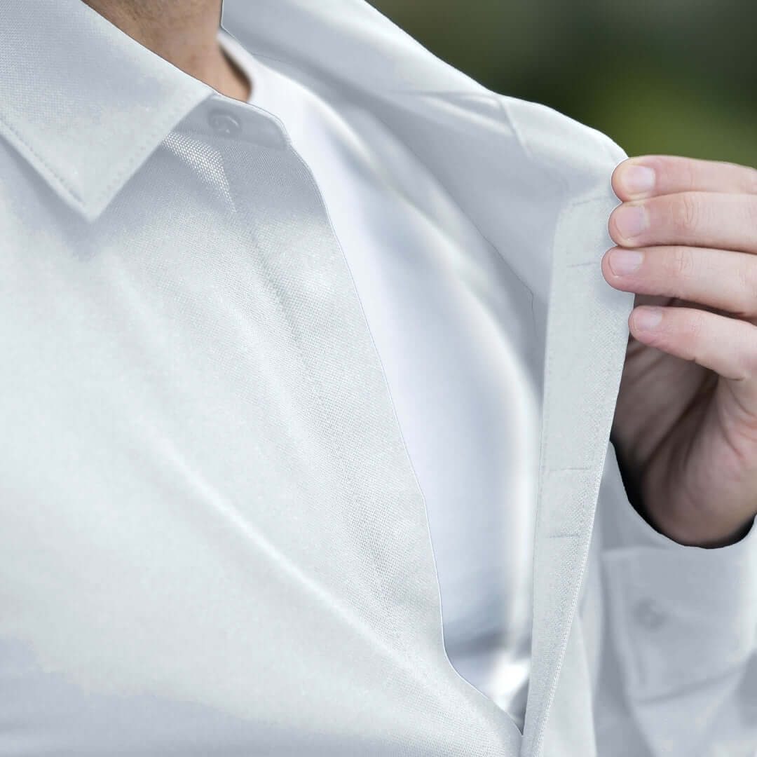 Close up of MagnaReady white cooling shirt hidden magnetic front closure detail.