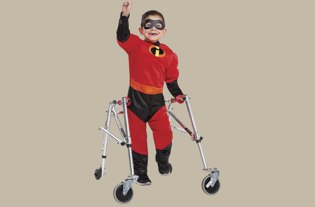 Child using a walker while wearing an adaptive Dash Halloween costume inspired by The Incredibles