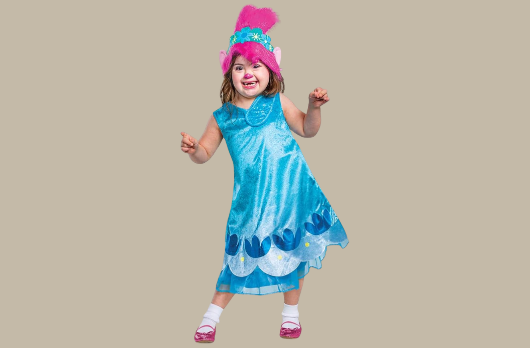 Child wearing a blue adaptive Poppy Halloween costume with accessible dress openings