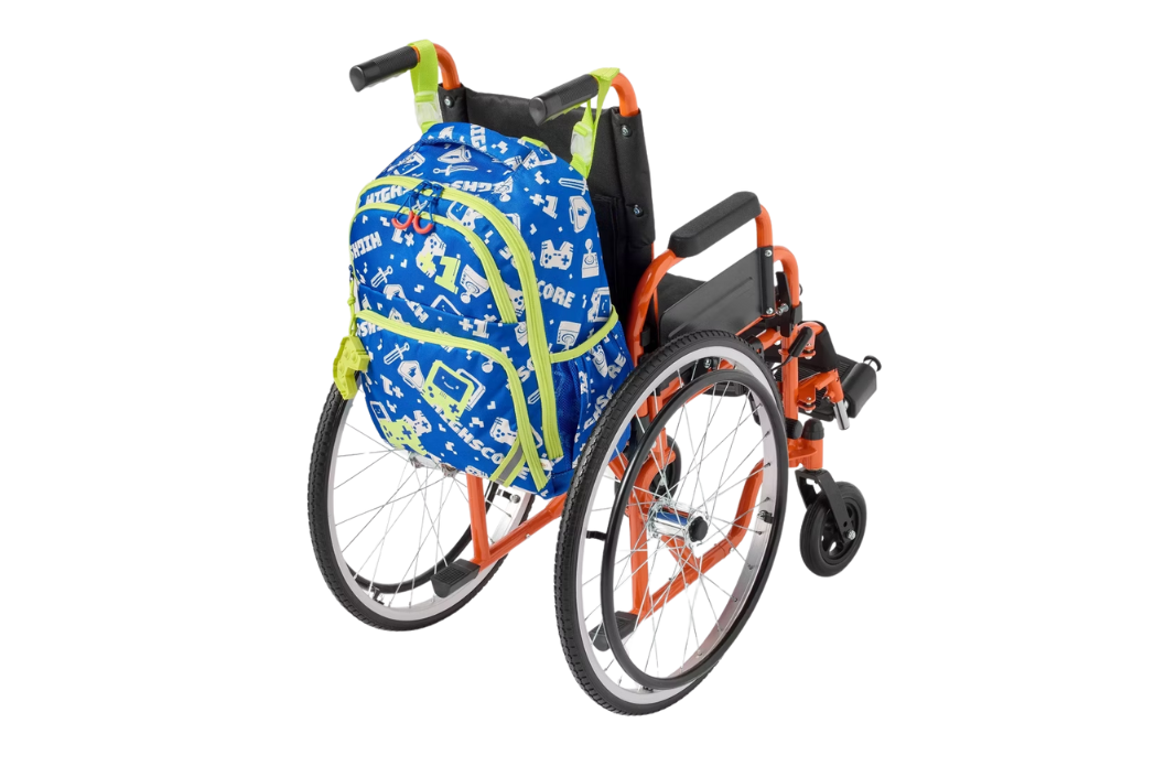 Blue graphic print kids backpack with neon yellow accents mounted to the back of an orange pediatric wheelchair, rear view