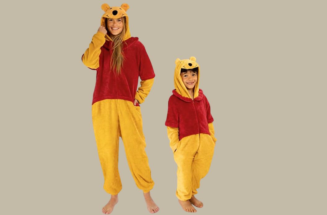 Adult and child wearing soft plush animal onesie costumes for Halloween