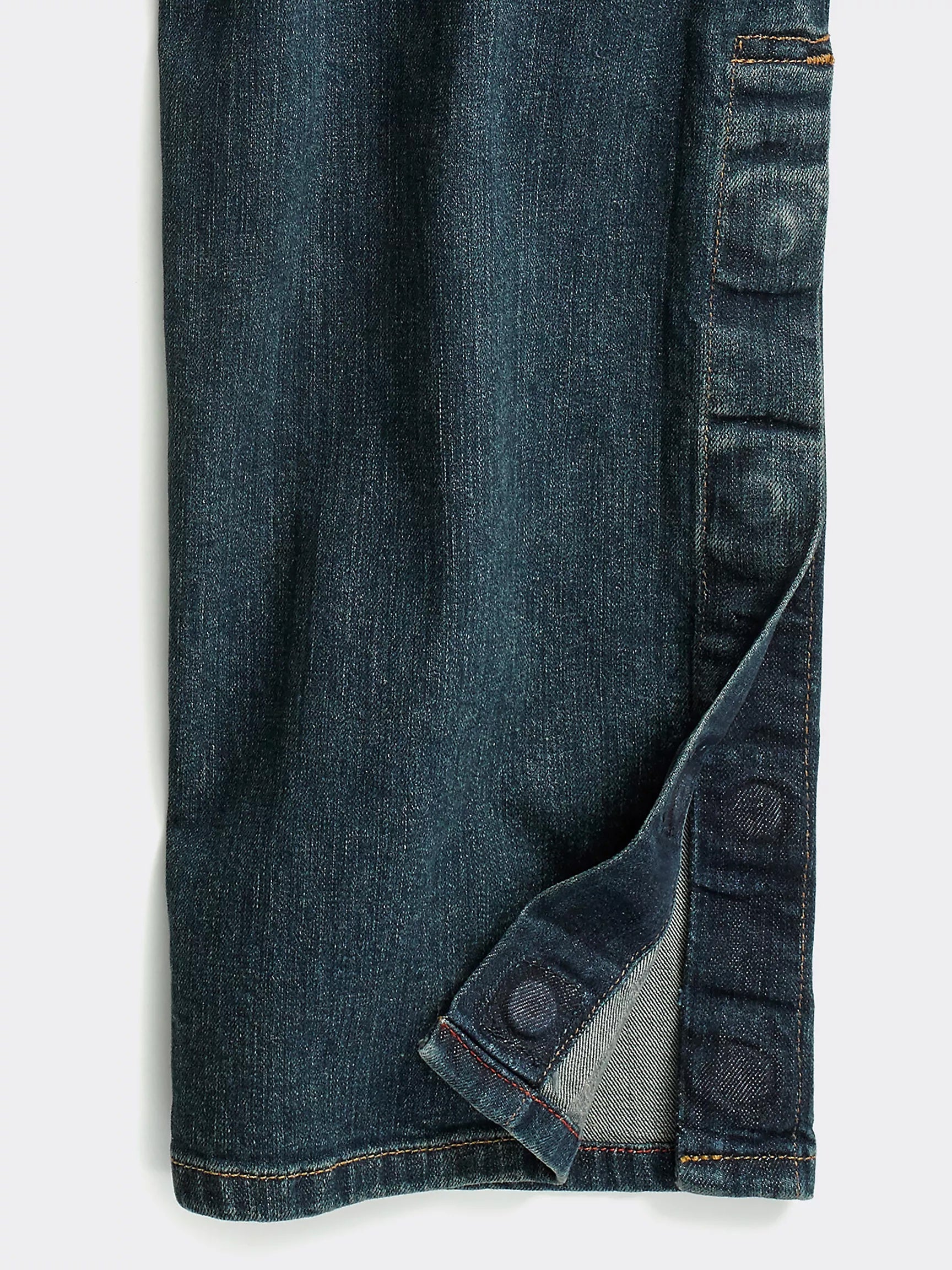 Adaptive jeans with side openings designed to accommodate prosthetics or leg braces