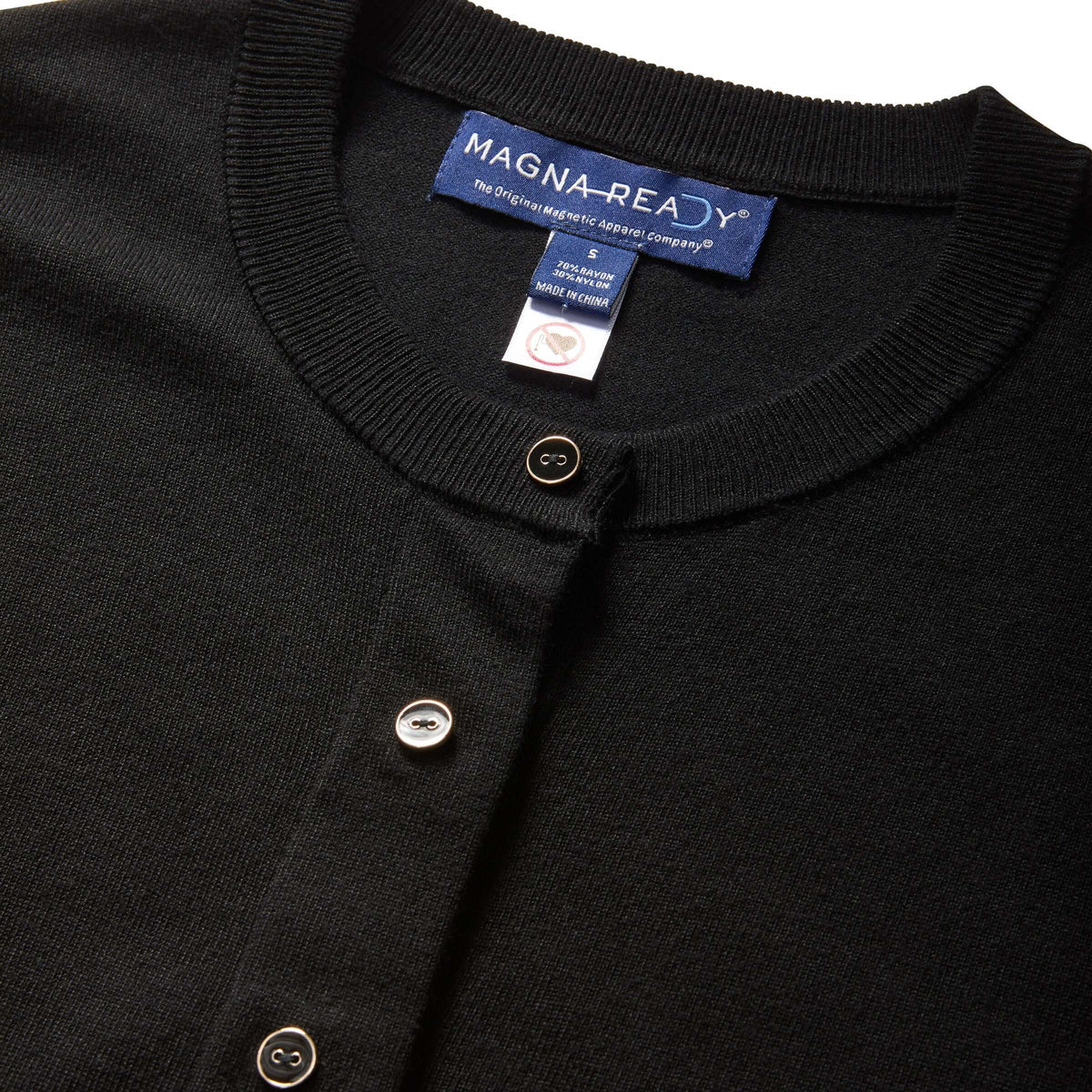 Close-up of MagnaReady black knit cardigan neckline and magnetic button detail.